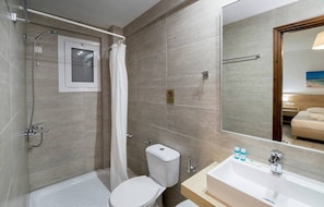 Hair dryer, towels, soap, shampoo