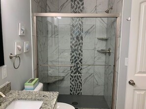 Combined shower/bathtub