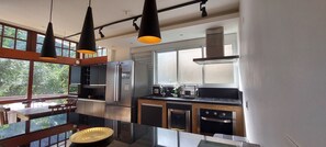 Family Chalet | Private kitchen | Full-sized fridge, microwave, coffee/tea maker, cookware/dishes/utensils - Pedra Bonita Flats (Rio de Janeiro)