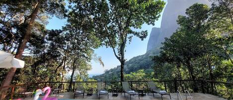 Outdoor pool, open 9:00 AM to 10:00 PM, pool umbrellas, sun loungers