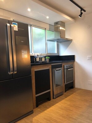 Apartment | Private kitchen | Full-sized fridge, microwave, coffee/tea maker, cookware/dishes/utensils - Pedra Bonita Flats (Rio de Janeiro)