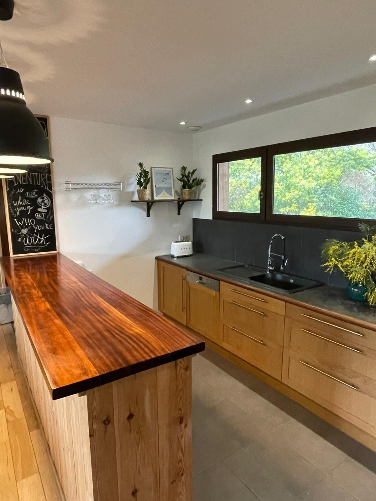 TYPICAL WOODEN HOUSE OF THE BASIN