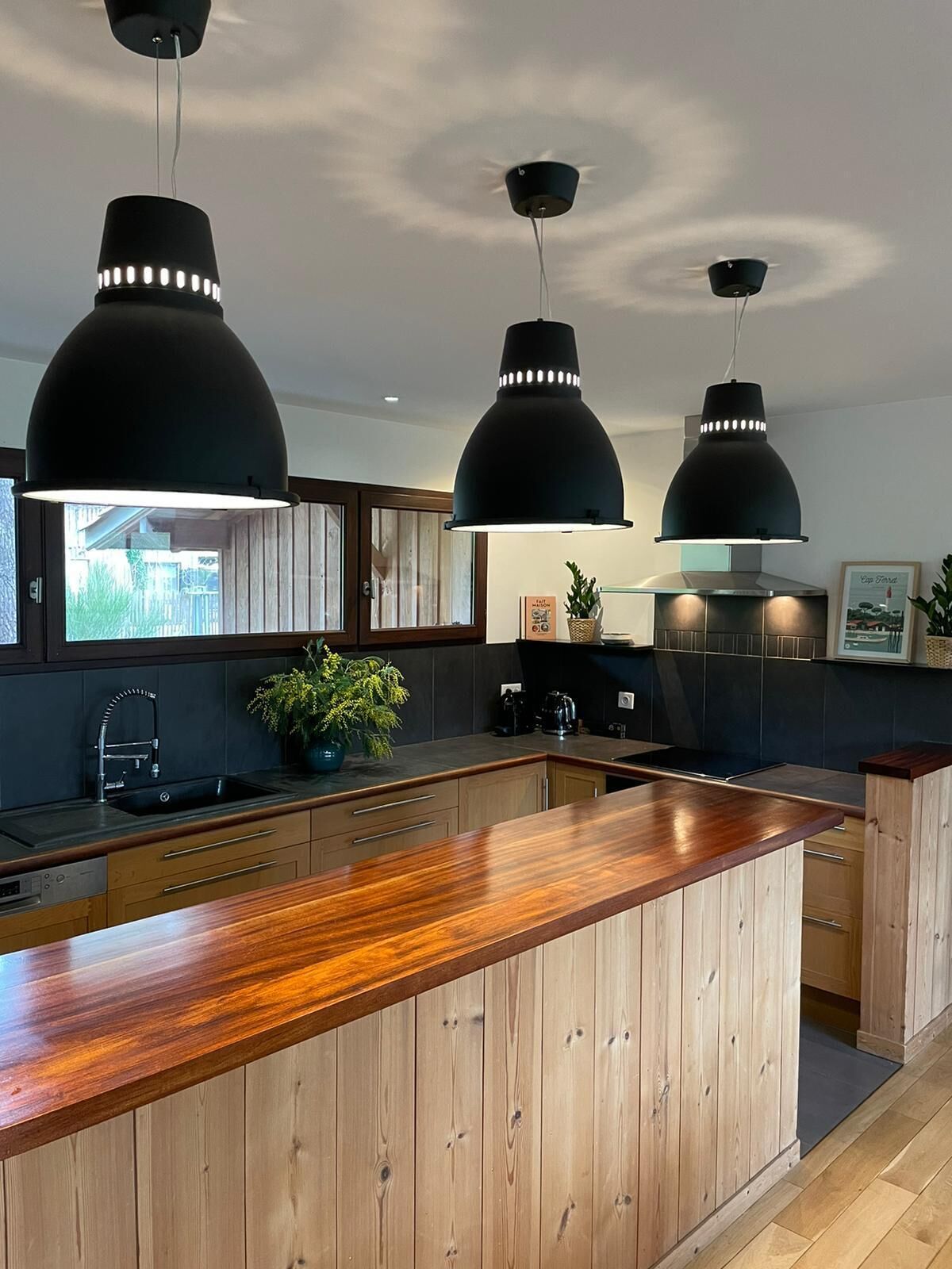 TYPICAL WOODEN HOUSE OF THE BASIN