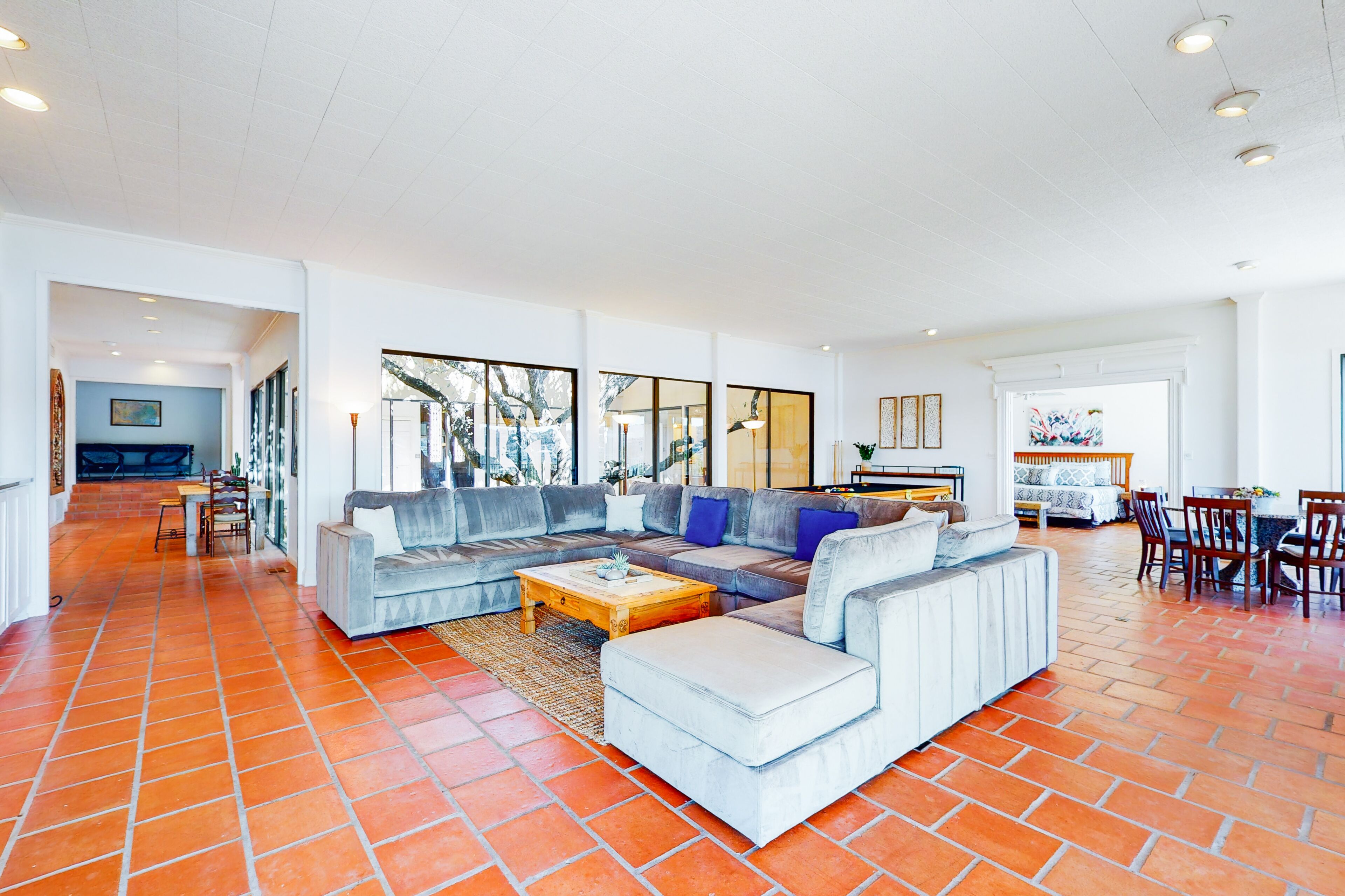 Incredible lakefront oasis with epic views, pool table, courtyard, & air hockey