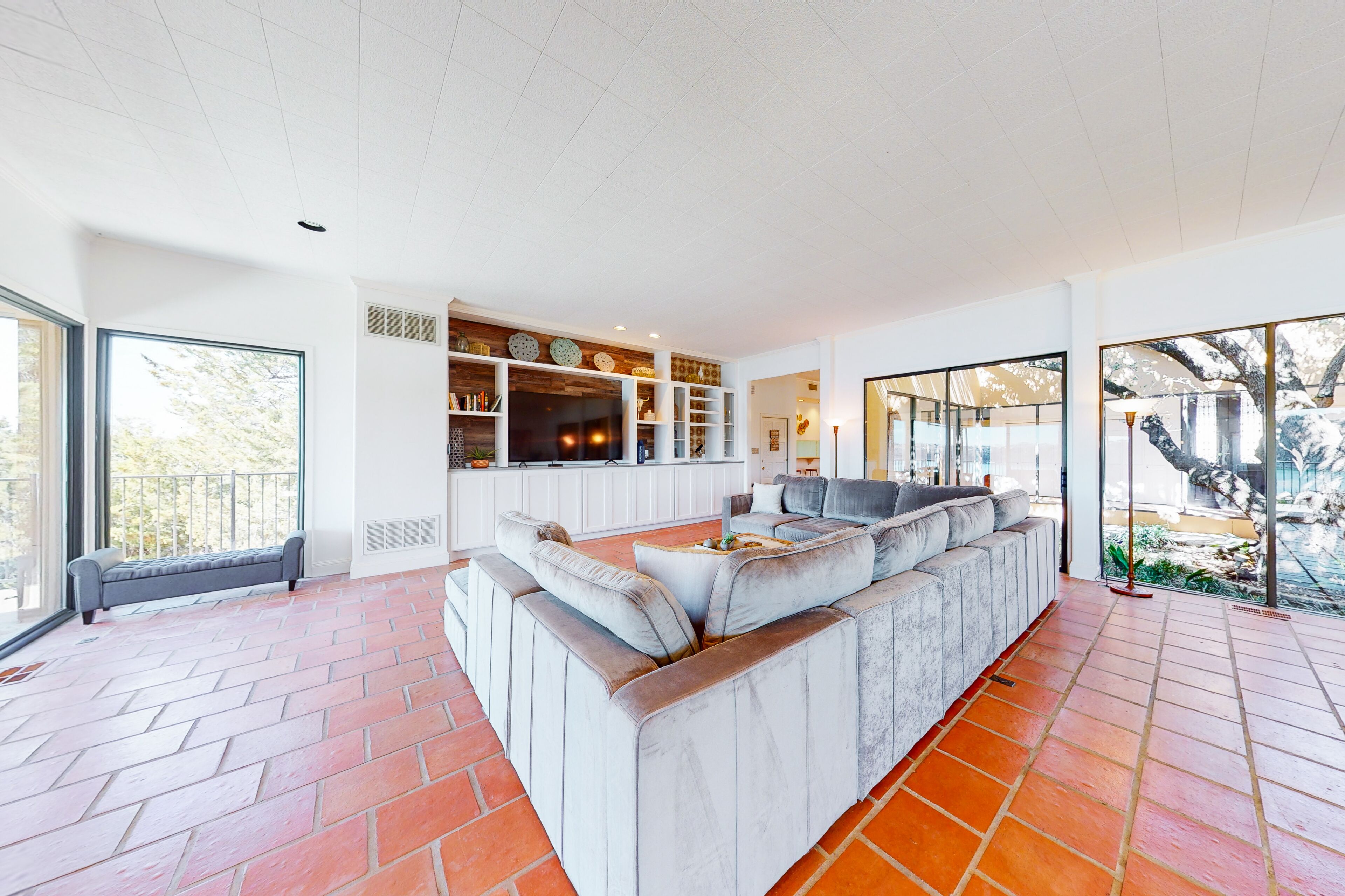 Incredible lakefront oasis with epic views, pool table, courtyard, & air hockey