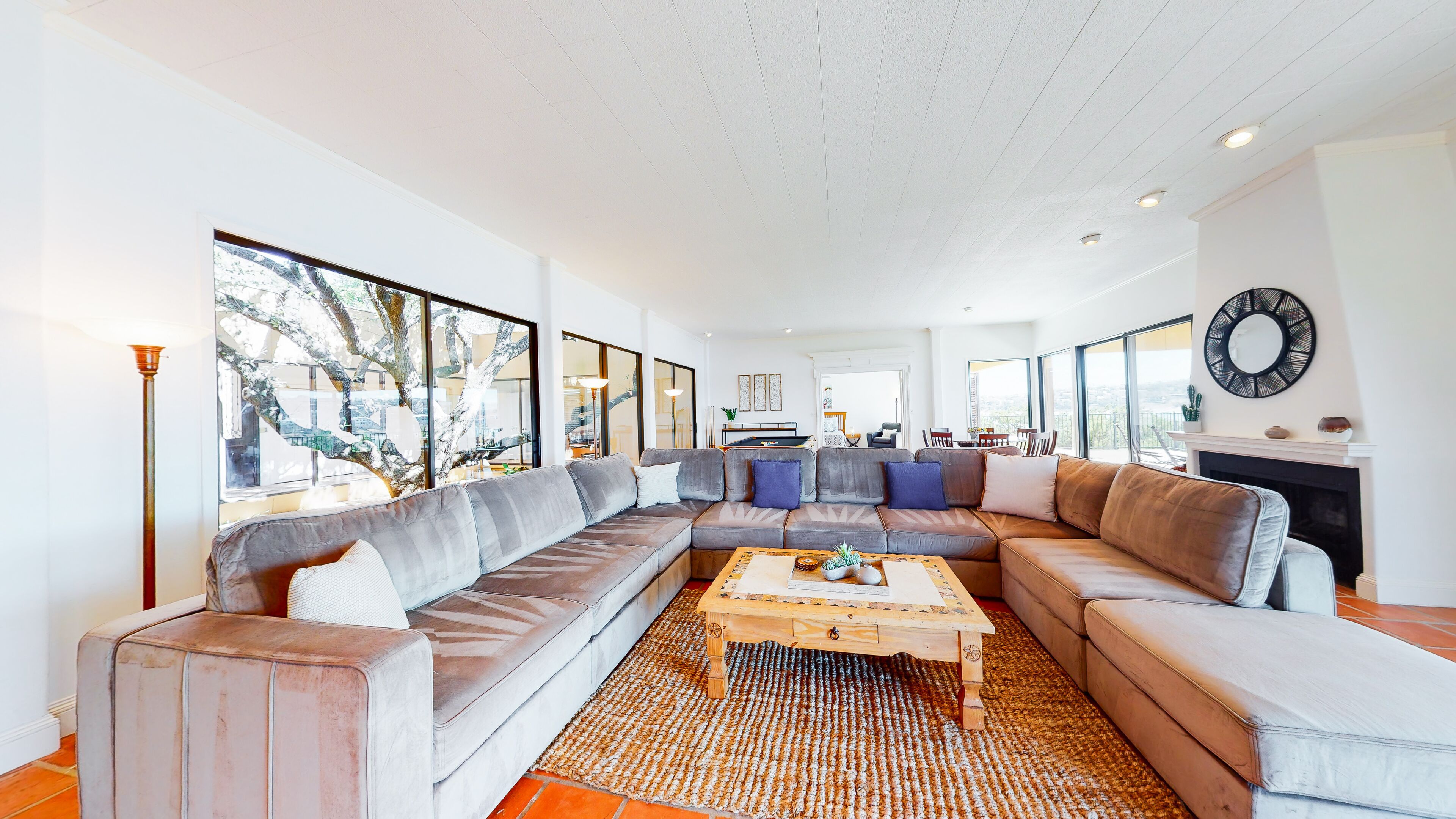 Incredible lakefront oasis with epic views, pool table, courtyard, & air hockey