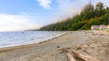 On the beach, sun loungers, beach towels