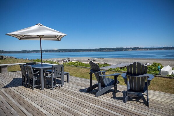Outdoor dining - Waterfront cabin w/ incredible views & beach access. (Langley)