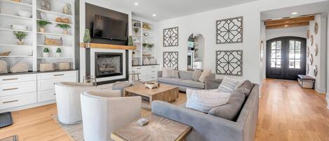 Televisión, chimenea, videojuegos, futbolito