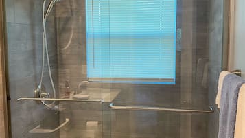 Shower, hair dryer, towels, soap