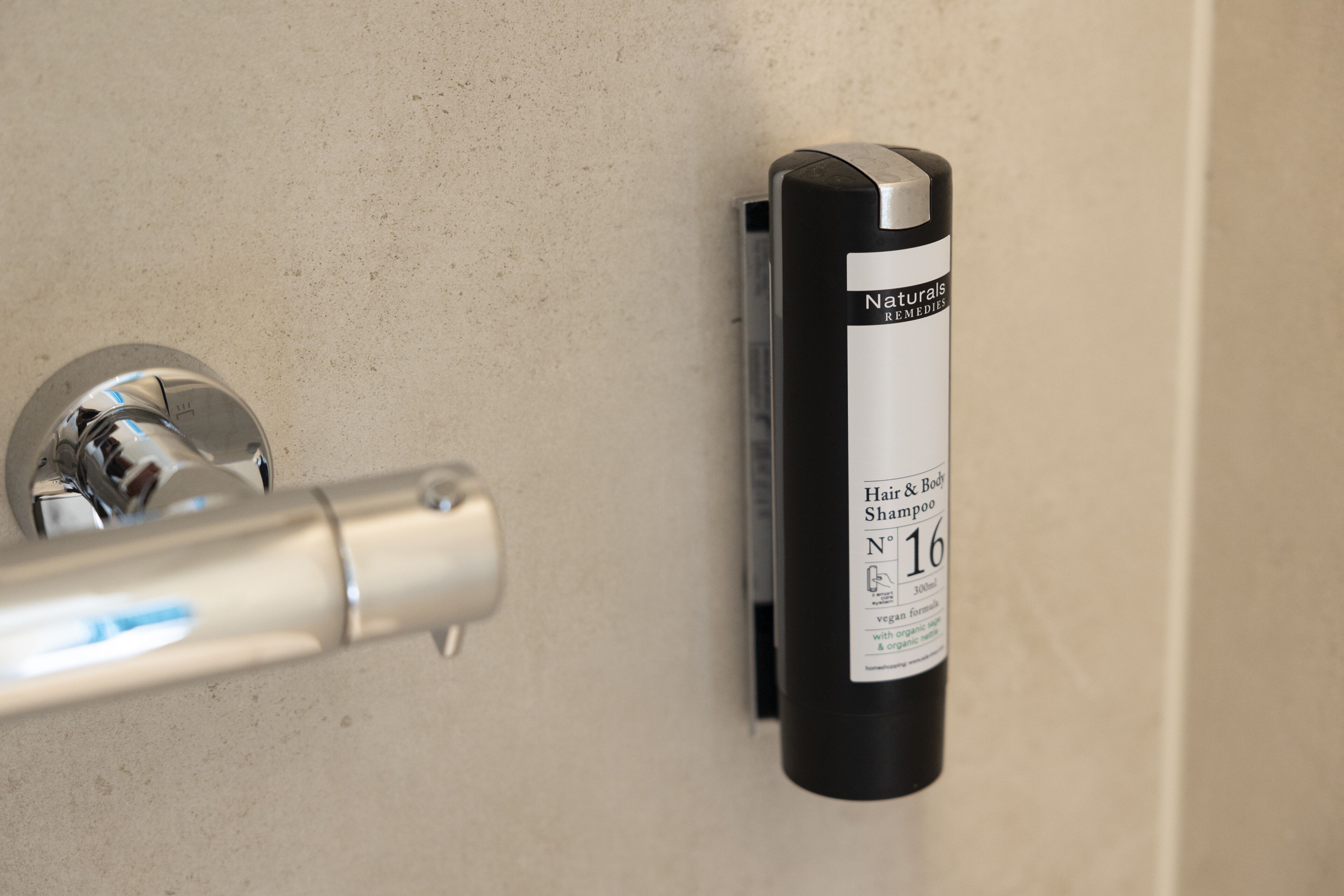 shower, rainfall showerhead, hair dryer, towels