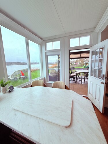 RiverView Retreat – Where Classic Charm Meets Coastal Comfort