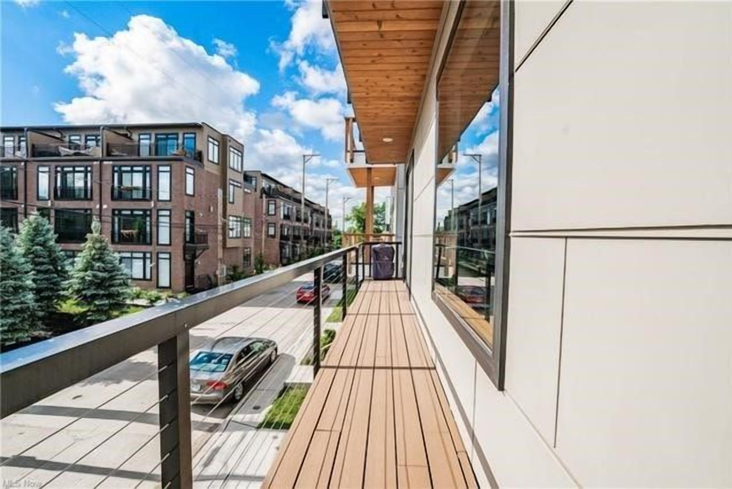 the second floor balcony may be skinny, but it wraps around one side of the house to the other and is perfect for late summer cocktails 