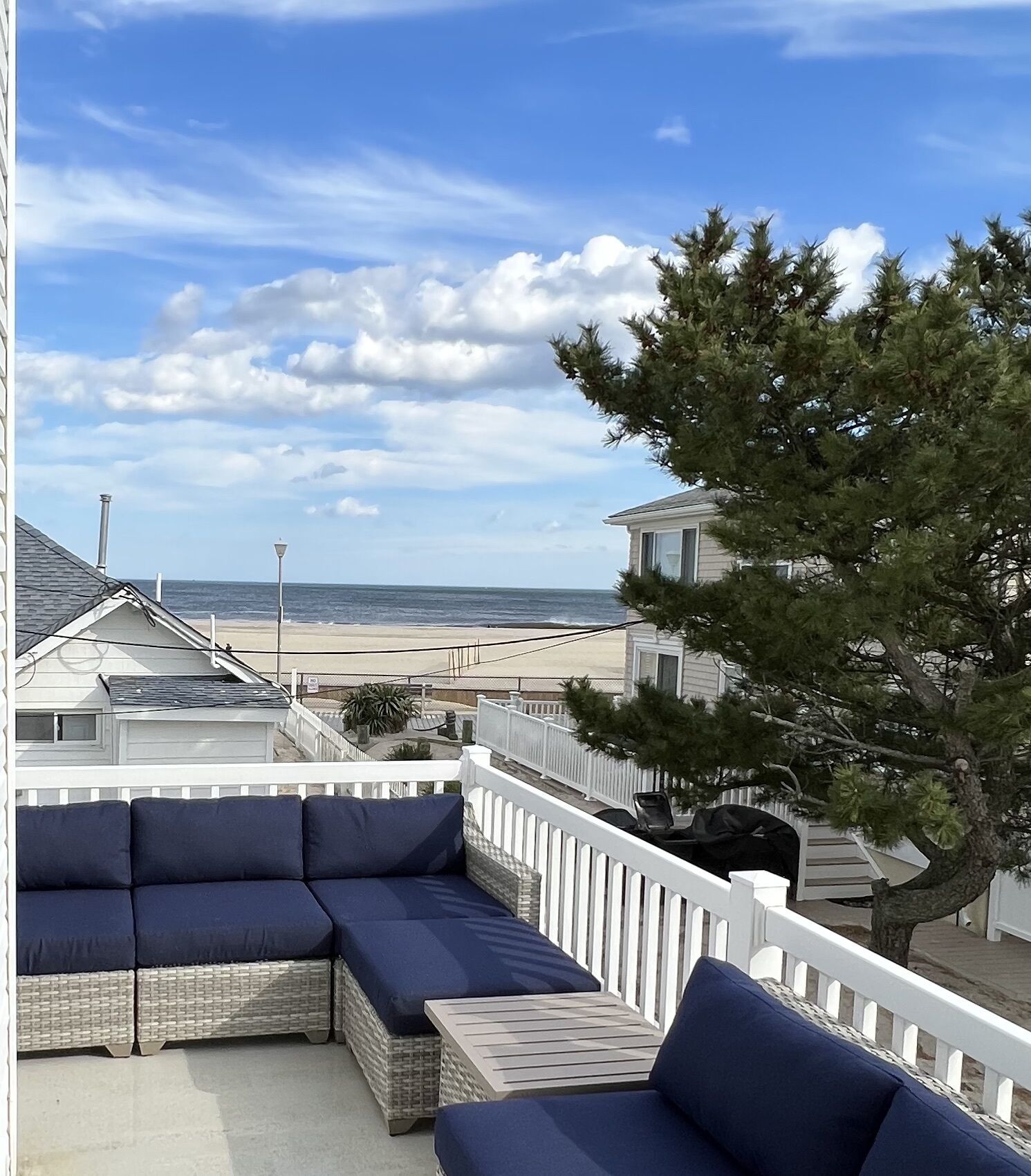 Steps from beach/boardwalk! Ocean views and hot tub! Parking Included!