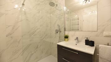 Shower, free toiletries, hair dryer, towels