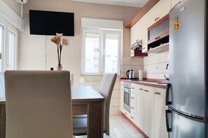 Fridge, microwave, oven, stovetop - Apartment Neon - One Bedroom Apartment with Balcony (Zadar)