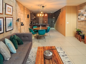 Design Loft, 1 Bedroom, Patio | Living area | 42-inch Smart TV with digital channels, TV