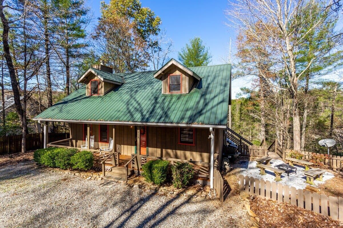 Cabin with Firepit area to right.