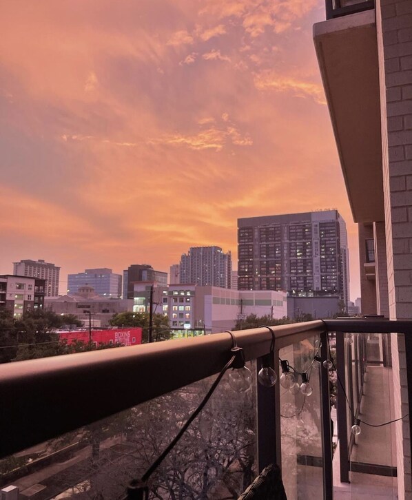 Enjoy breathtaking city views from the balcony with a clear view of the city skyline.