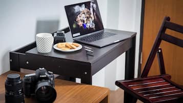 Deluxe Room, 1 King Bed | Desk, iron/ironing board, free WiFi, bed sheets