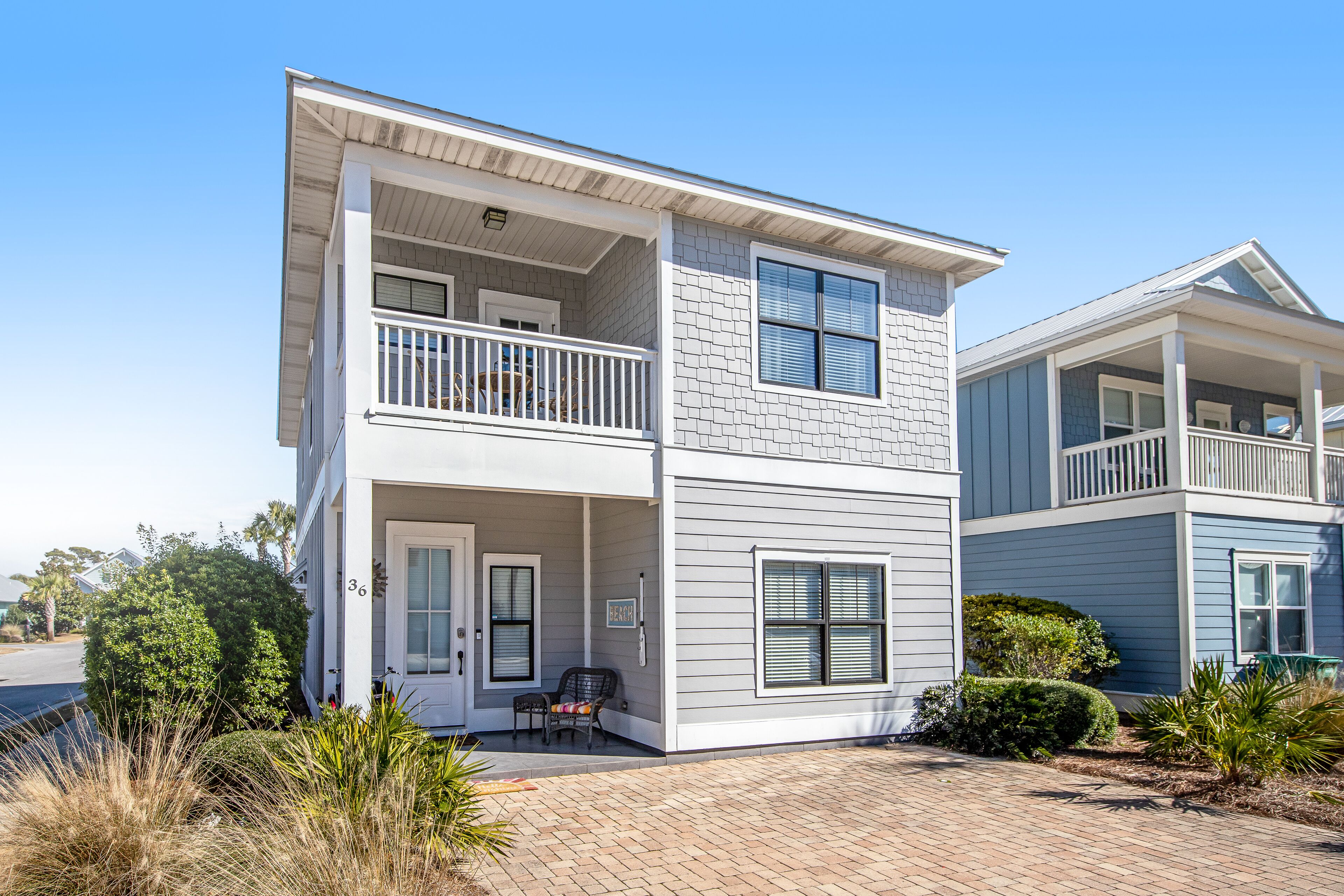 Modern beach home with pool, WiFi, washer/dryer, central AC, and gas grill