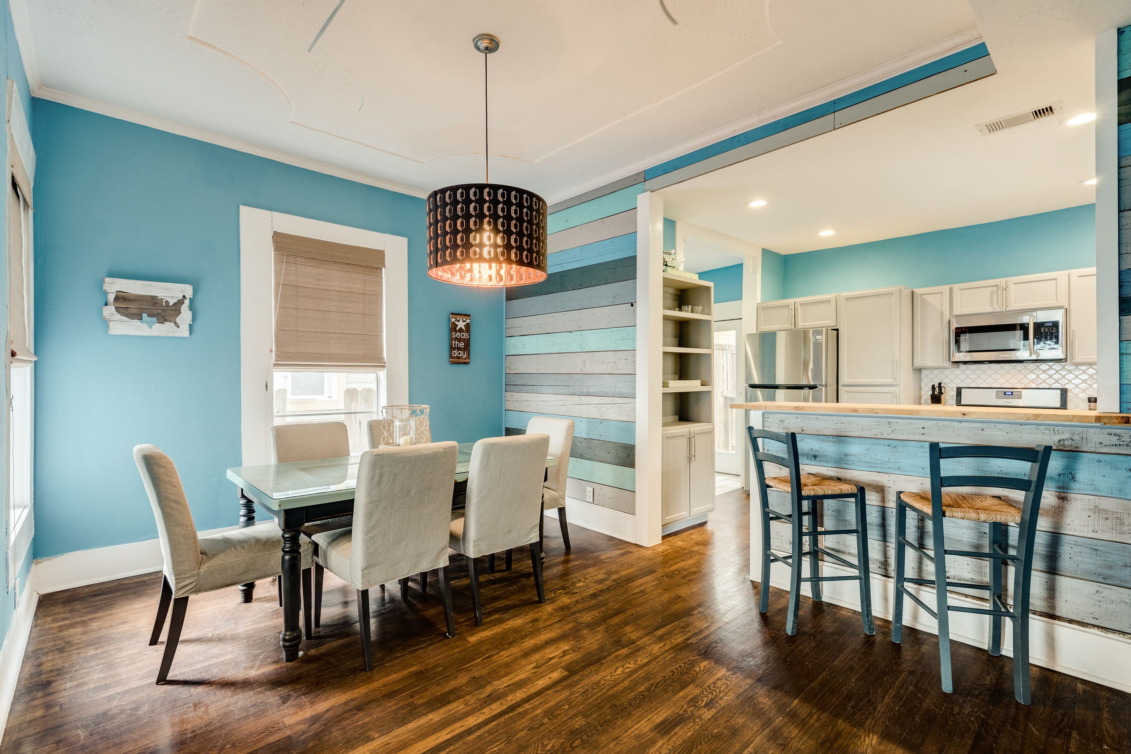 Gulf-view getaway with AC, WiFi, and enclosed yard with shared courtyard & grill