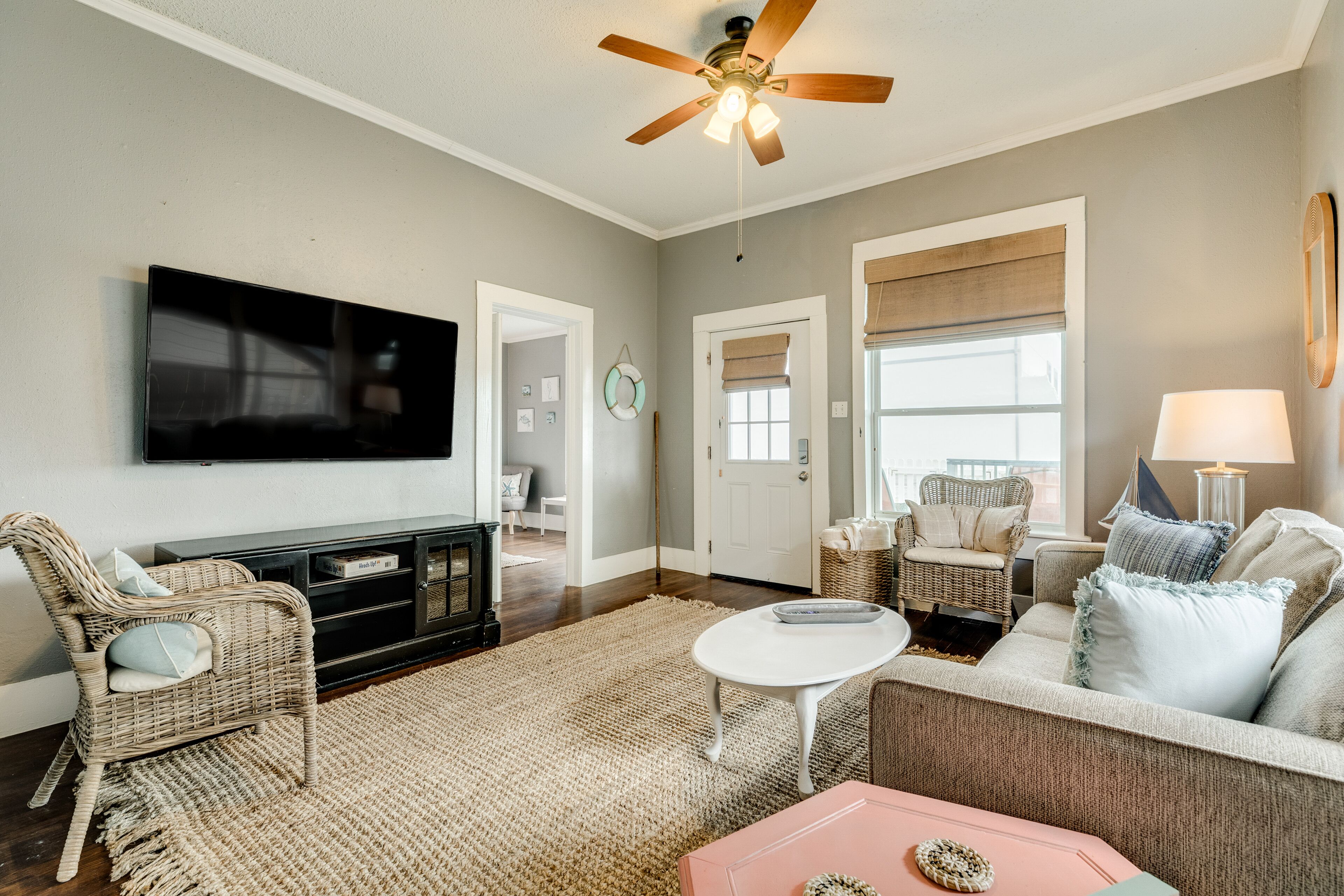 Gulf-view getaway with AC, WiFi, and enclosed yard with shared courtyard & grill