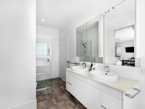 Bathtub, hair dryer, towels