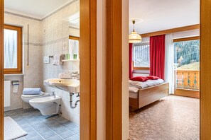 Bathtub, hair dryer, towels