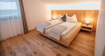 Appartement 'Zum Sonnentor - Pinus' avec vue sur les montagnes, balcon et Wi-Fi