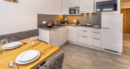 Appartement 'Zum Sonnentor - Pinus' avec vue sur les montagnes, balcon et Wi-Fi