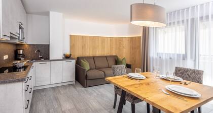 Appartement 'Zum Sonnentor - Larix' avec vue sur les montagnes, balcon et Wi-Fi