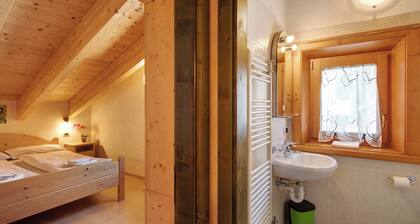 Ferienwohnung Baita Bruno Fior di Loto mit Bergblick, Garten und WLAN