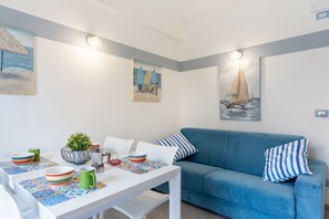 Dining - GuestHost - Comfortable and modern 40 sqm apartment with balcony, for 4 people, located on the first floor of a building (NO elevator) inside the Sileno Beach residential complex. The property is located in a central position, a few minutes on foot from  (Giardini Naxos)