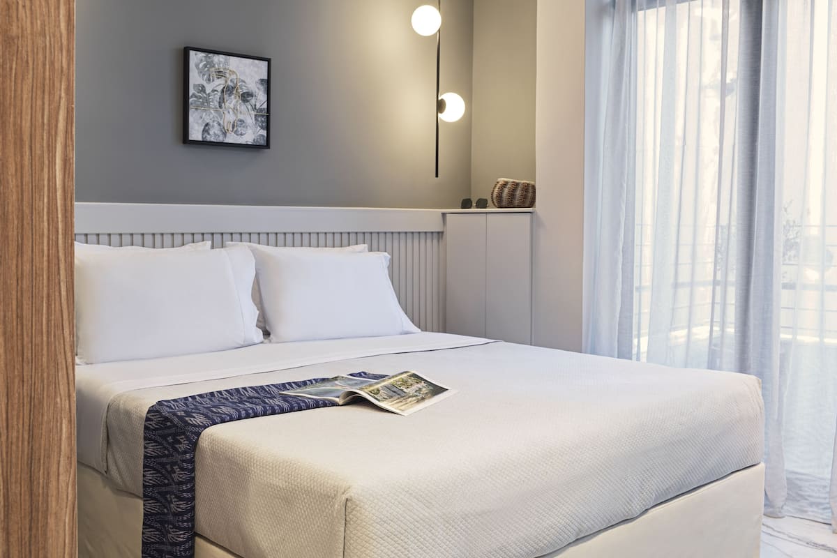 Superior Double Room with Balcony | Ropa de cama hipoalergénica, camas con pillow-top y minibar