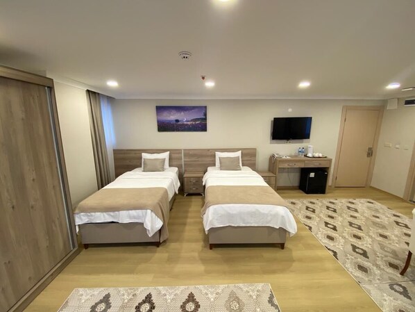 Grand studio suite, uitzicht op zee | Lakens van Egyptisch katoen, luxe beddengoed, een kluis op de kamer