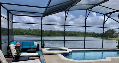 Luxury Lake Home near parks and MCO airport. Private Pool and spa. Themed rooms.