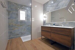 Bathtub, hair dryer, towels, soap