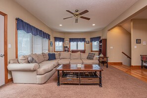 40-inch TV with cable channels, fireplace