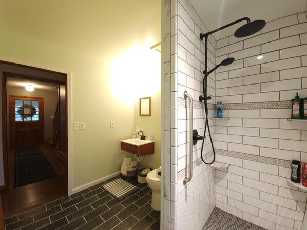 A bathroom with a shower, toilet, and sink. - The Farmhouse, where peace and quiet awaits (Otego)