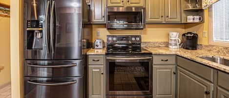 House, Multiple Beds, Fireplace | Private kitchen | Fridge, microwave, oven, stovetop