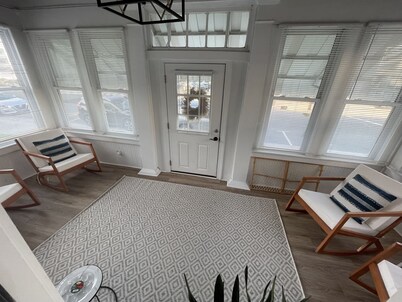 Updated and perfect Location Boardwalk and Beach steps away Large family home