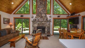 40-inch TV with cable channels, fireplace