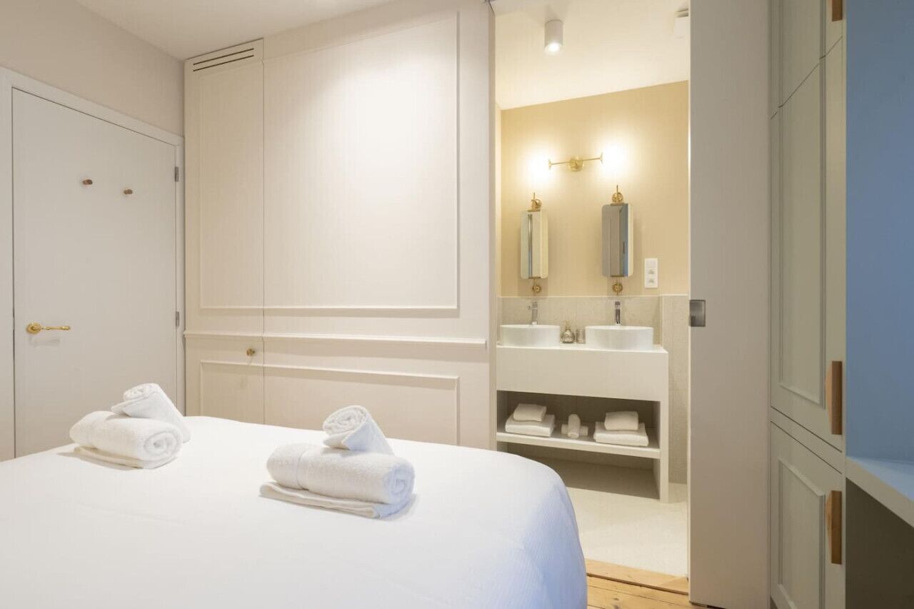 1 bedroom, desk, iron/ironing board, travel crib