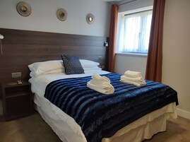 Standard Room | Individually furnished, desk, laptop workspace, blackout drapes