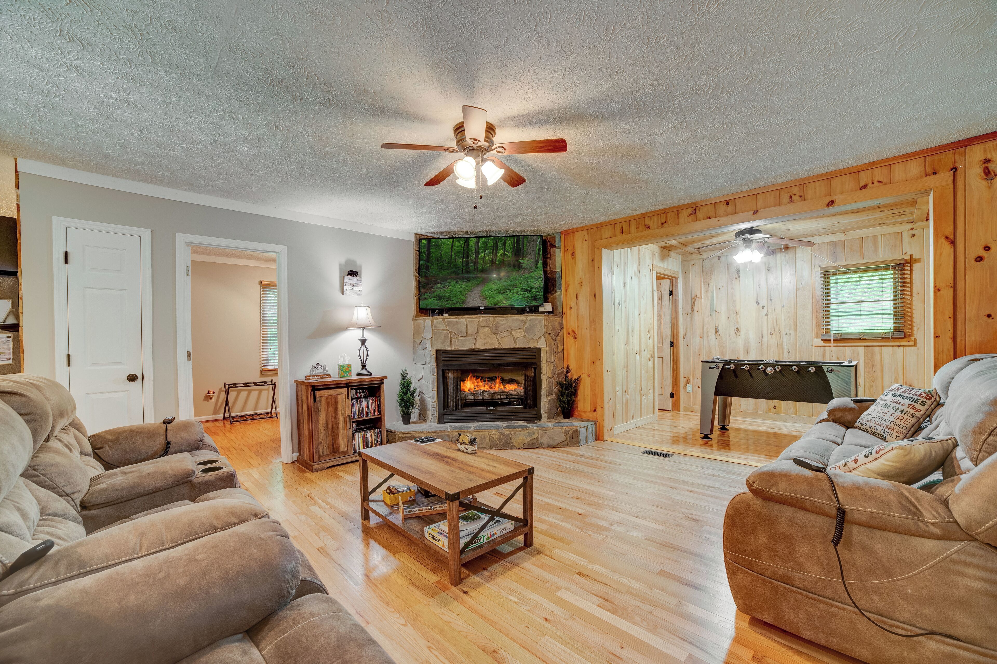 Smart TV, fireplace, DVD player, foosball
