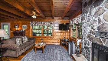 40-inch TV with cable channels, fireplace