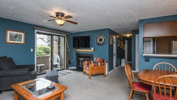House, Multiple Beds, Balcony | Living room | 40-inch TV with cable channels, fireplace
