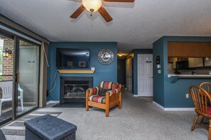House, Multiple Beds, Balcony | Living room | 40-inch TV with cable channels, fireplace