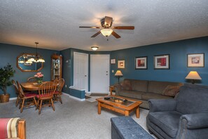 House, Multiple Beds, Balcony | Living room | 40-inch TV with cable channels, fireplace